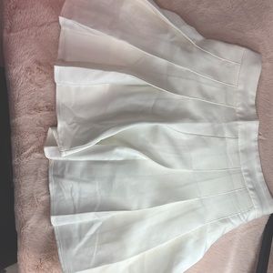 a super cute mid length white skater skirt!!